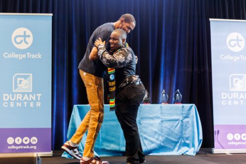 Kevin Durant hugs College Track scholar Davvid Cole